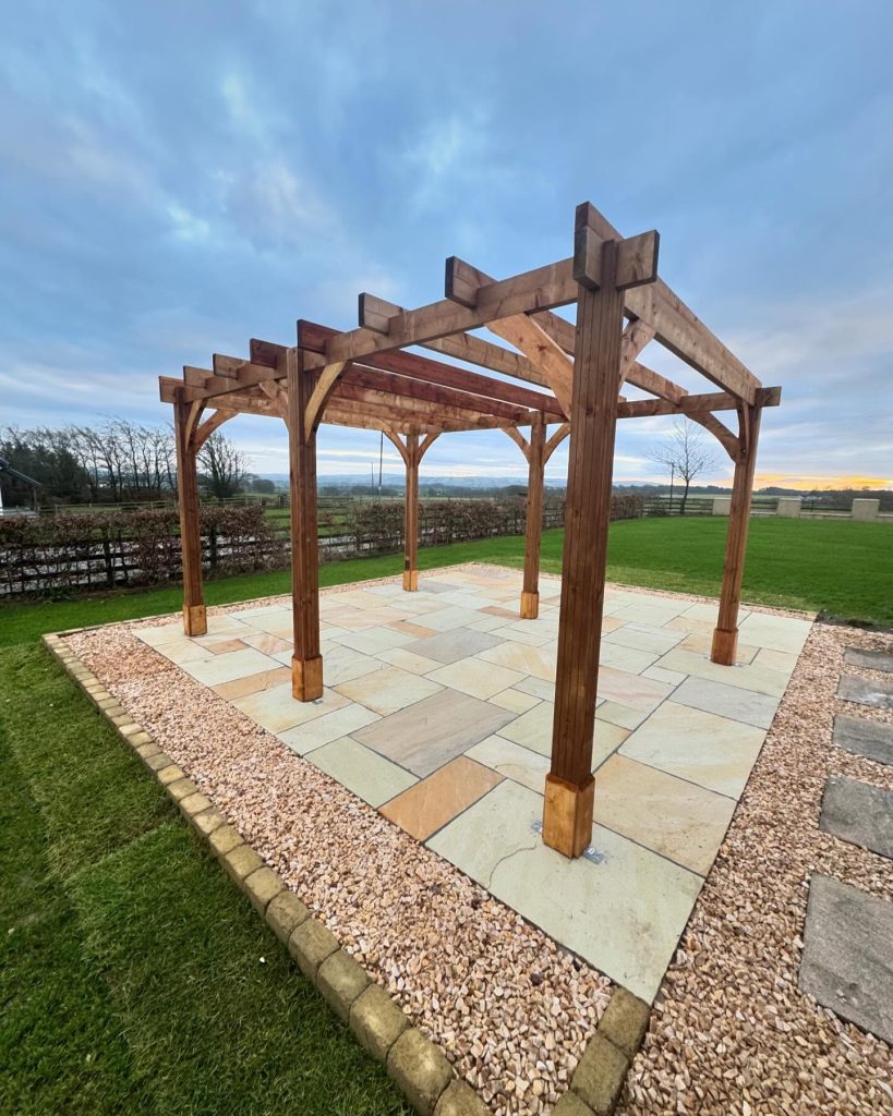 Custom wooden pergola and patio installation
