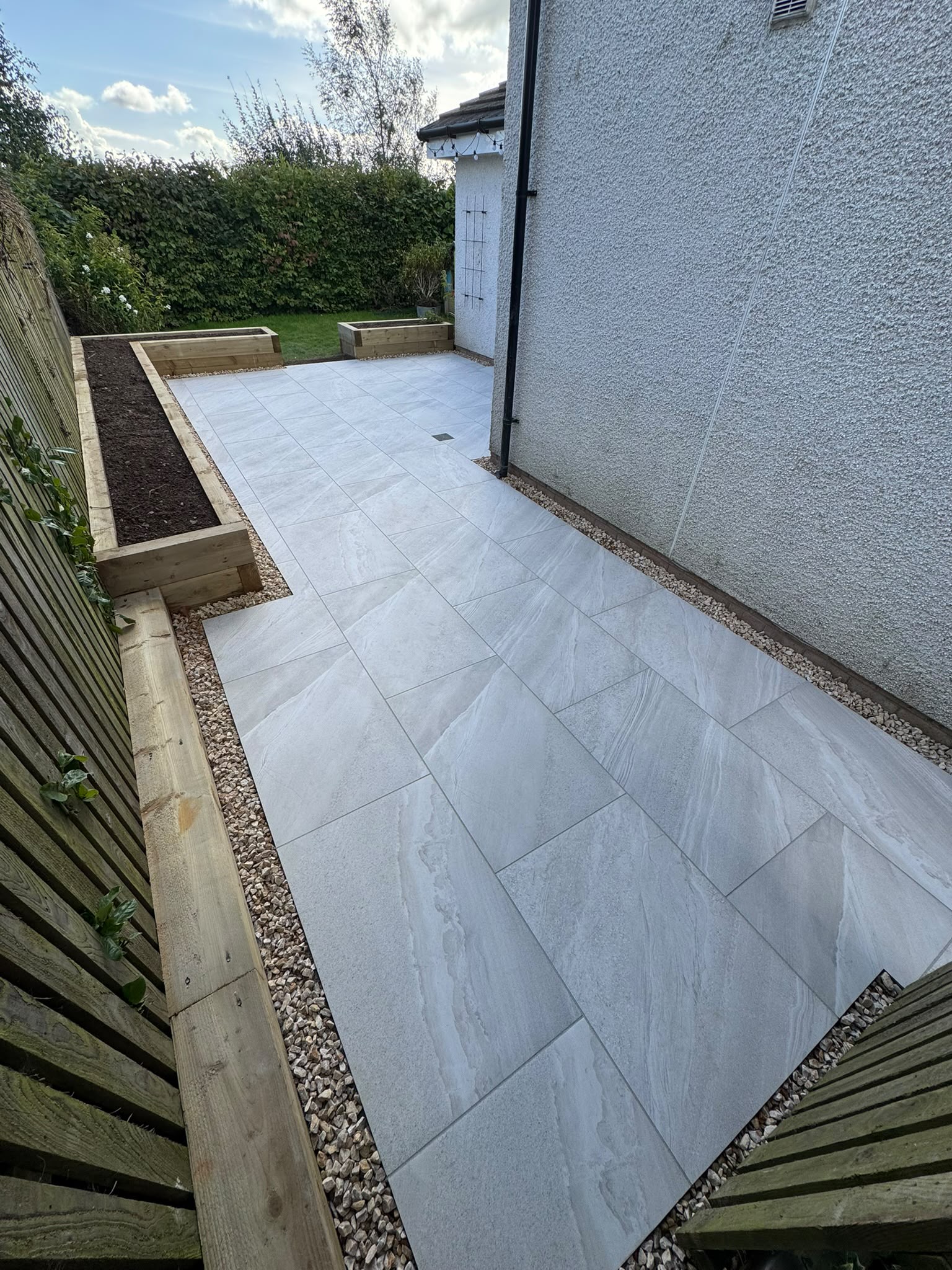 Porcelain patio garden transformation in Strathaven